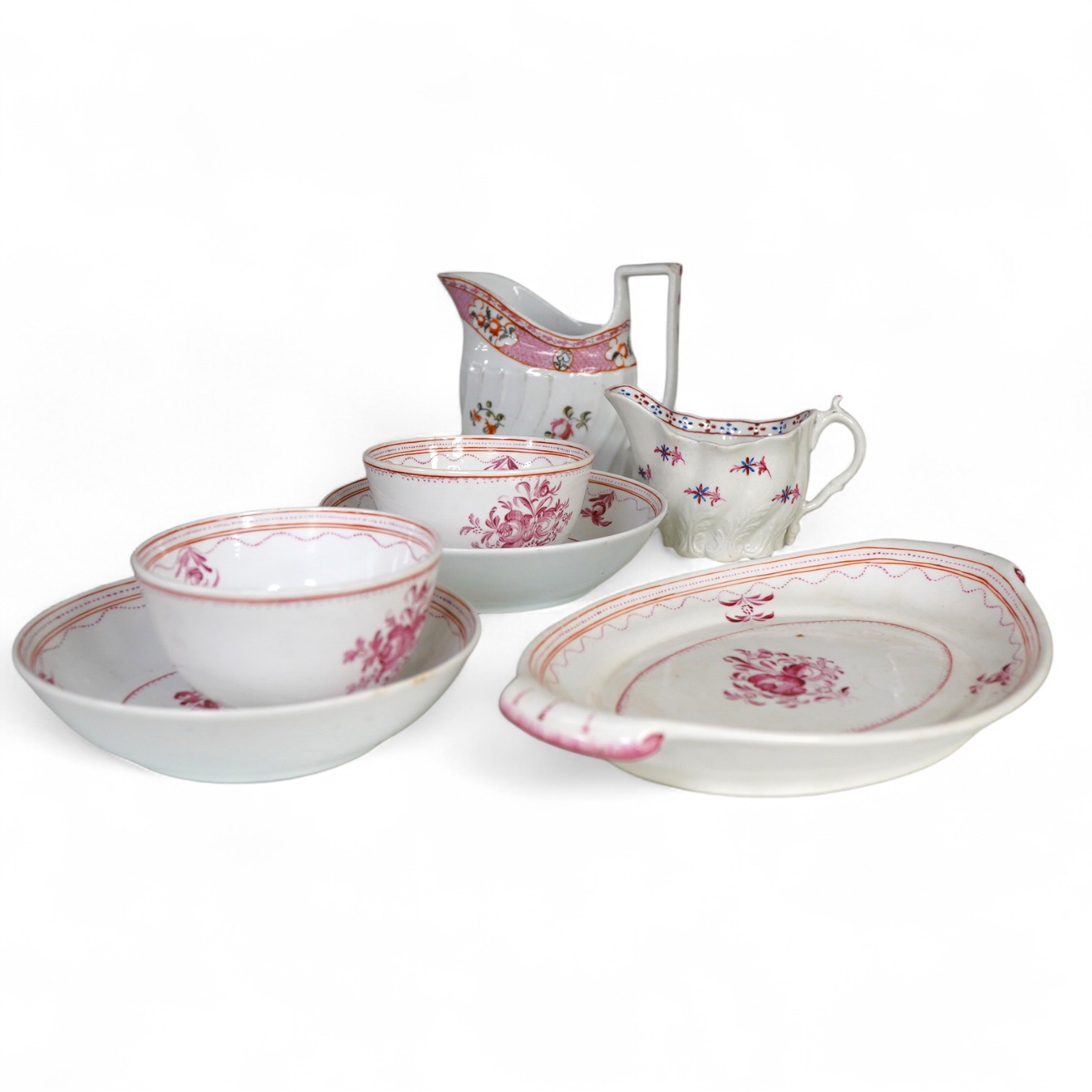 Seven pieces of 18th century New Hall porcelain including jugs, tea bowls, etc.